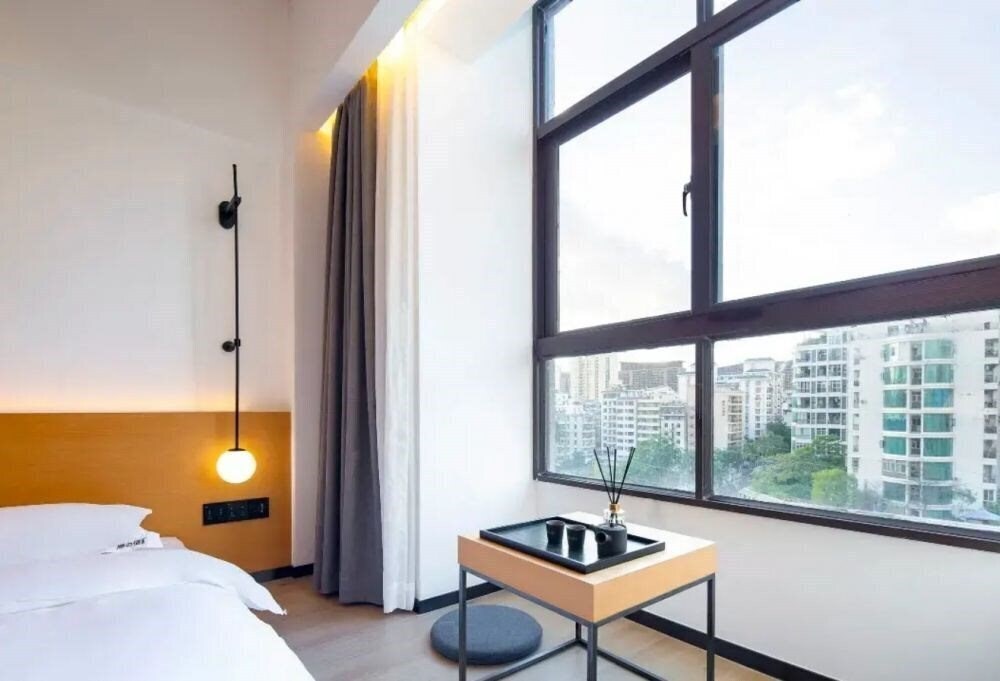 Территория Daisy Inn Sanya (ex. Sanya Yuanye Ying Xing Hotel) 3*